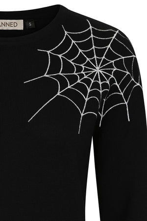 Black sweater with spider web design on a white background