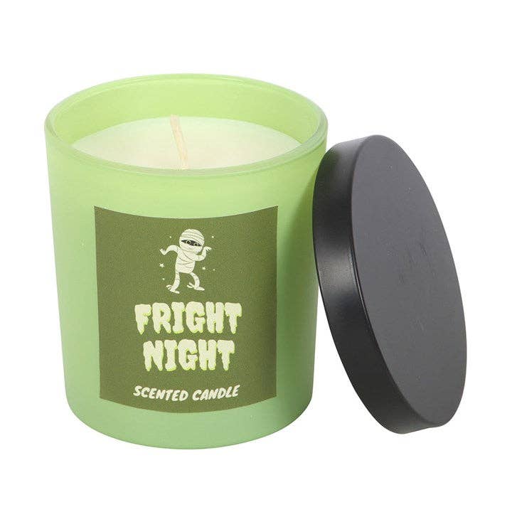 Green scented candle with a label reading 'Fright Night' on a white background