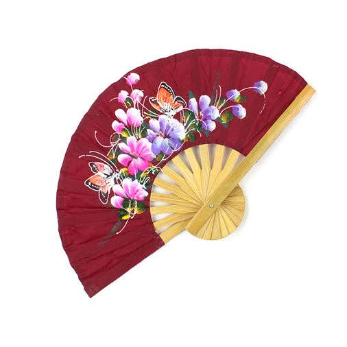 Decorative fan with floral design and butterflies on a red background