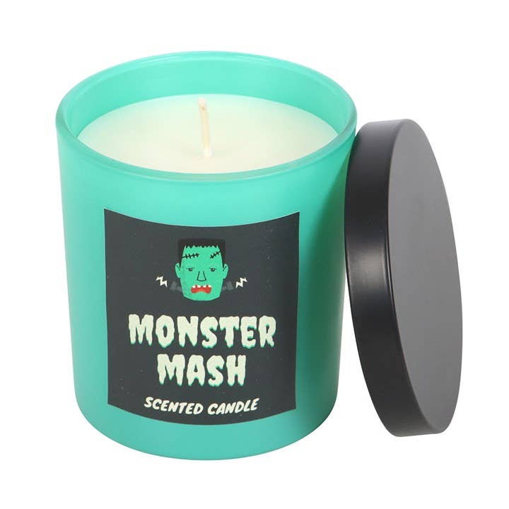 Scented candle with 'Monster Mash' label on a white background