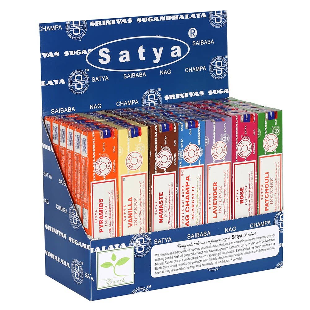 Display of Satya incense boxes in various colors with a blue packaging box.