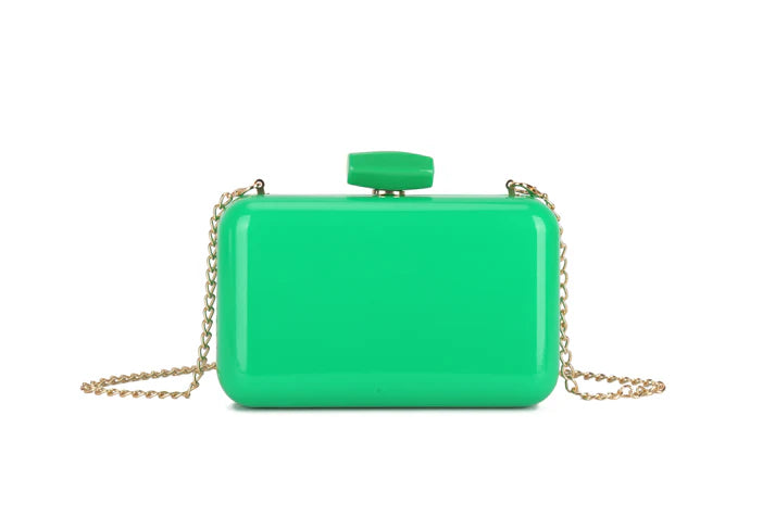 Green clutch bag with a gold chain on a white background