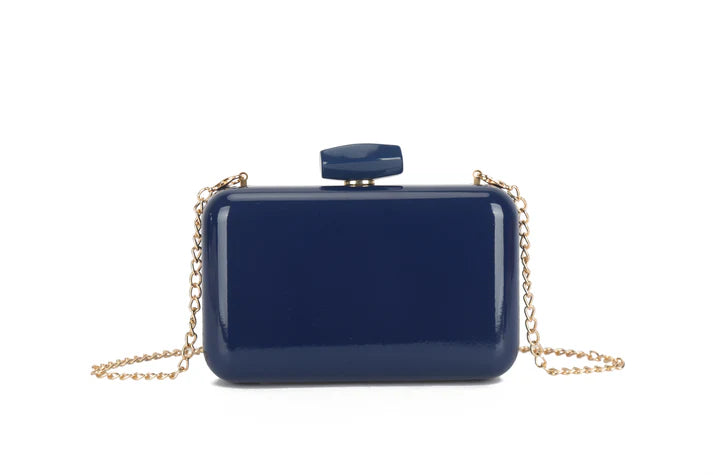 Navy blue clutch bag with a gold chain on a white background