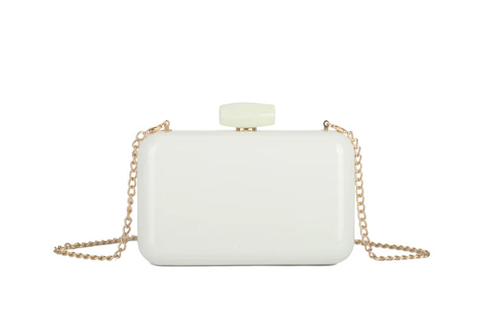 White clutch bag with gold chain on a white background