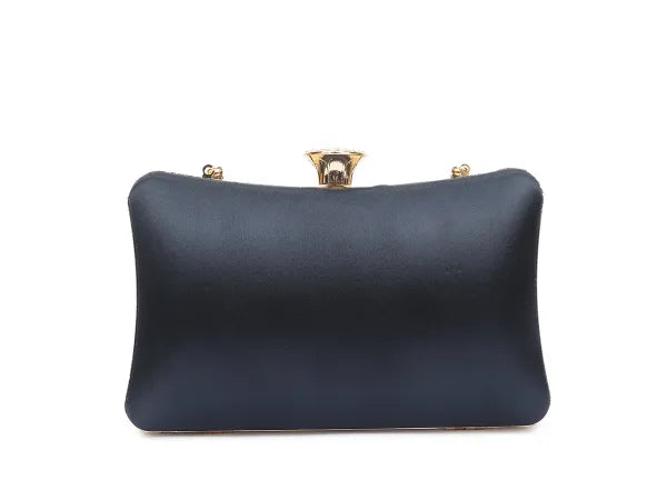 Navy blue clutch bag with gold clasp on a white background