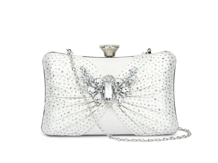 Silver clutch bag with crystal embellishments on a white background