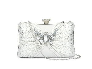 Silver clutch bag with crystal embellishments on a white background