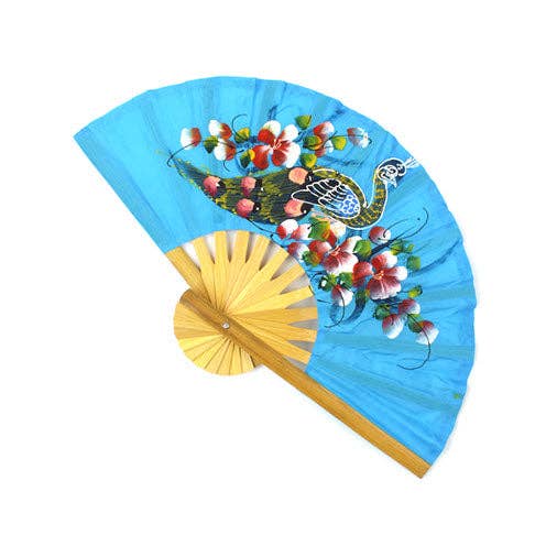 Decorative fan with floral design on a blue background